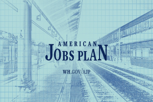 Blueprint eines Bahnhofes mit der Aufschrift "American Jobs Plan" und einem Zug auf der rechten Seite.