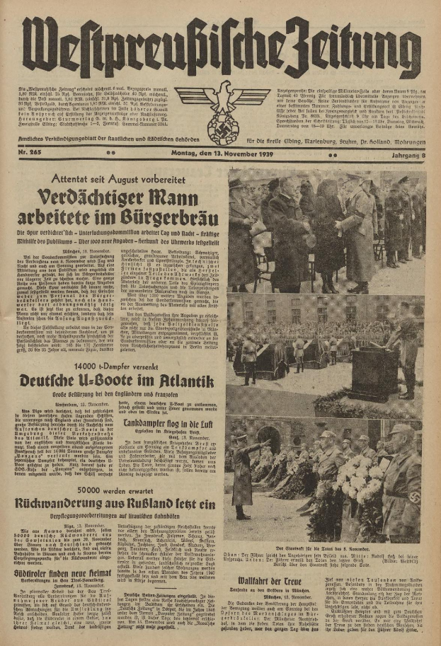 Alte deutsche Zeitungsvorderseite vom 13. November 1939 mit der Überschrift "Weitpreubliche Zeitung", die eine Gruppe von Menschen in traditioneller deutscher Kleidung in einer feierlichen Umgebung zeigt.