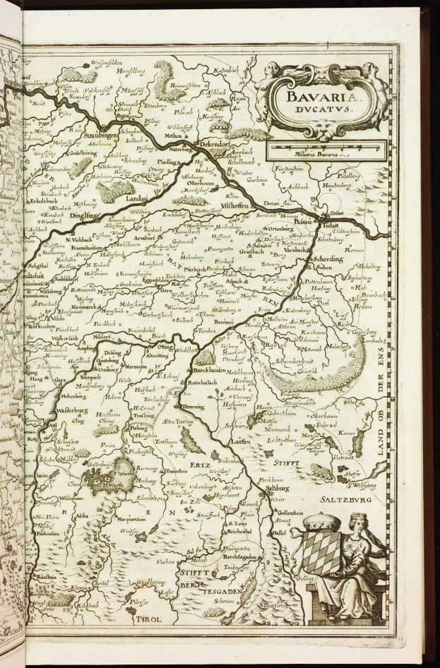 Offenes Buch mit detaillierter Karte von Bayern mit beschrifteten Städten, Dörfern, Flüssen und geografischen Merkmalen.