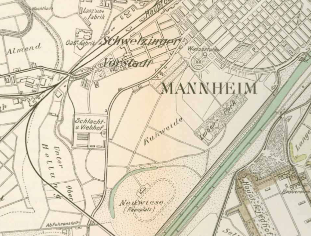 Ein detaillierter alter Stadtplan von Mannheim, Deutschland, mit Straßen, Gebäuden und Sehenswürdigkeiten in Blau-, Grün- und Gelbtönen.