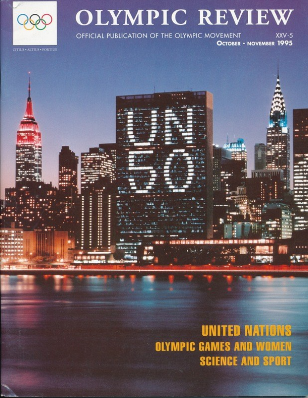 Titelbild des "Olympic Review Official Publication of the Olympic Movement"-Buchs, das eine Stadtlandschaft mit Gebäuden, Lichtern und Wasser zeigt und Text enthält, der "United Nations Olympic Games and Women Science and Sport" lautet.