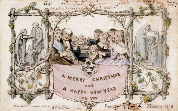 Eine Gruppe von Menschen in Festkleidung versammelt sich um einen Tisch unter einem Banner mit der Aufschrift "Fröhliche Weihnachten und ein gutes neues Jahr", die fröhlich feiern.